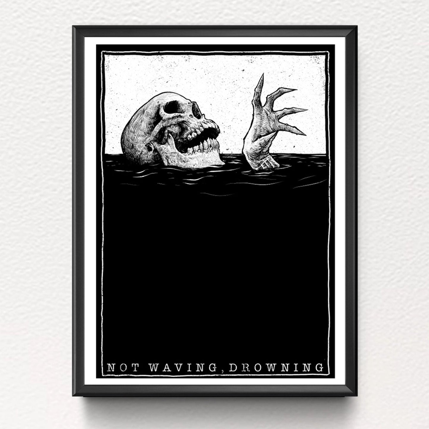 Frames example of A4 sized lithoprint featuring a drowning skull reaching out from water and phrase not waving, drowning. Frame not included in listing.
